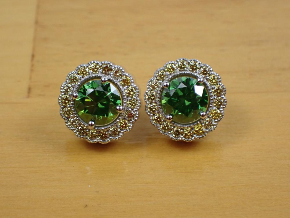 Appraisal: PAIR OF FANCY GREEN AND YELLOW STUD EARRINGS each k