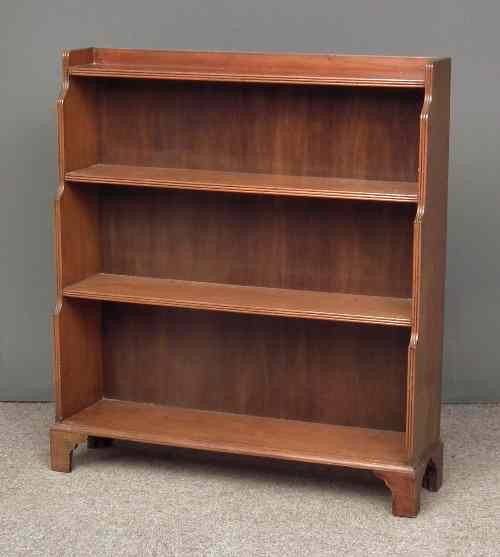 Appraisal: A mahogany four tier open front ''Waterfall'' bookcase of Georgian