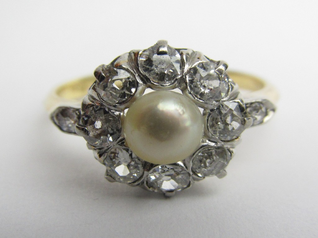 Appraisal: Edwardian ct gold and platinum pearl and diamond cluster ring