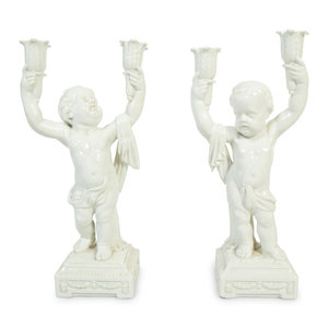 Appraisal: A Pair of Italian Creamware Figural Candelabra th Century Height