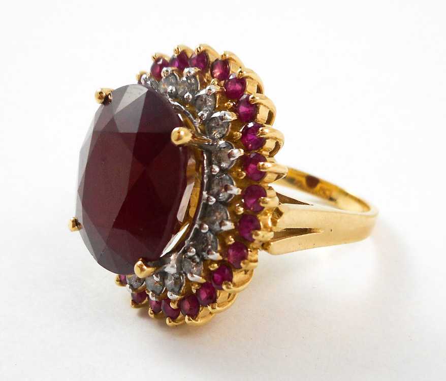 Appraisal: RUBY DIAMOND AND FOURTEEN KARAT GOLD RING with round-cut rubies