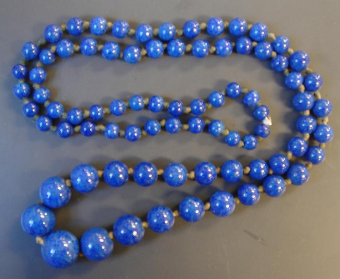 Appraisal: Strand of blue Glass Beads Continuous strand of graduated lapis