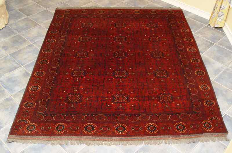 Appraisal: HAND TIED BOKHARA RUG Rich red and darkest blue approx