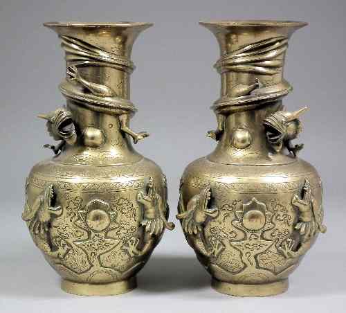 Appraisal: A pair of Chinese bronze bulbous vases the bodies embossed