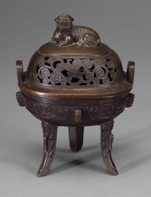 Appraisal: Chinese bronze tripod censer ding form lid with Buddhist lion