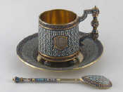 Appraisal: A Russian silver gilt cup saucer and spoon the cup