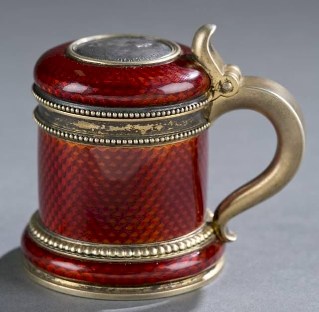 Appraisal: Faberge silver-gilt enamel miniature tankard A silver-gilt and guilloche miniature