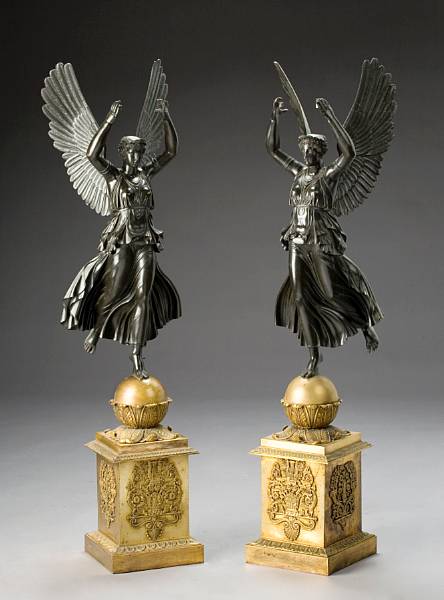 Appraisal: A pair of French gilt and patinated bronze figures in