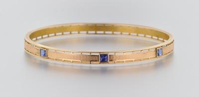 Appraisal: A Bangle Bracelet with Blue Spinels k yellow gold bangle