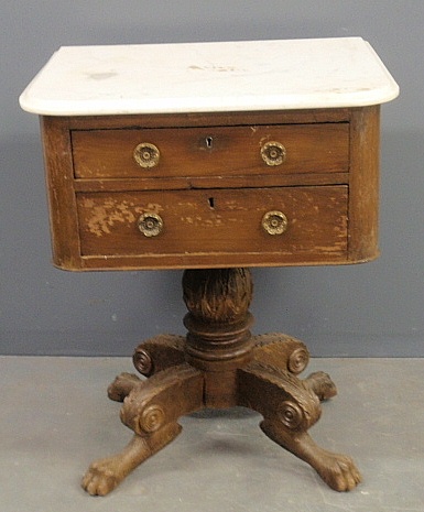 Appraisal: - Empire mahogany two-drawer table c with marble top and