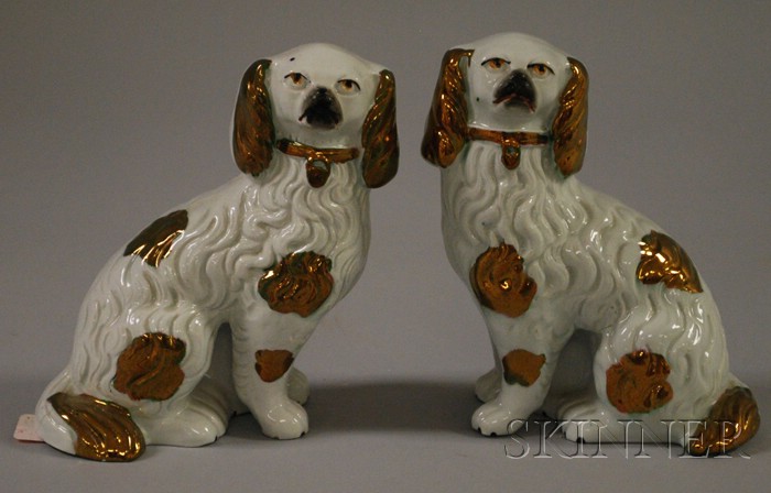 Appraisal: Pair of Staffordshire Copper Lustre Seated Spaniels ht in