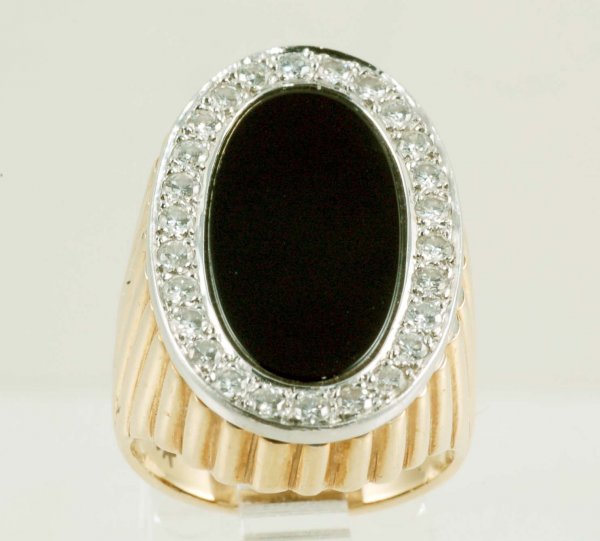 Appraisal: Ladies onyx and diamond fashion ring in marked K two