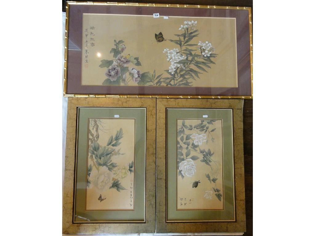 Appraisal: An oriental watercolour on silk panel of flowering plants and