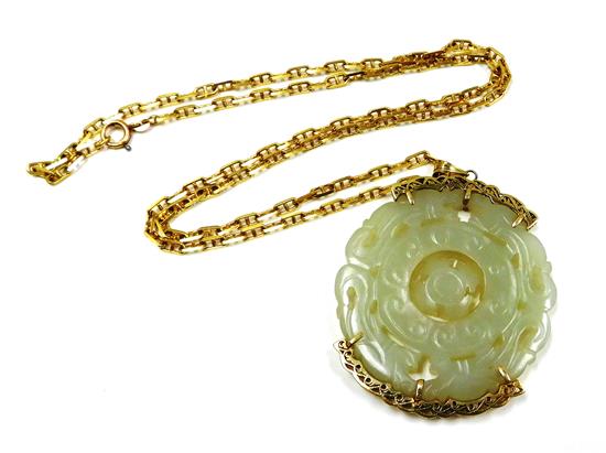 Appraisal: JEWELRY Antique jade prayer wheel pendant with K yellow gold