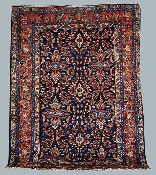 Appraisal: GOOD SEMI-ANTIQUE PERSIAN CARPET The rectangular deep blue field covered