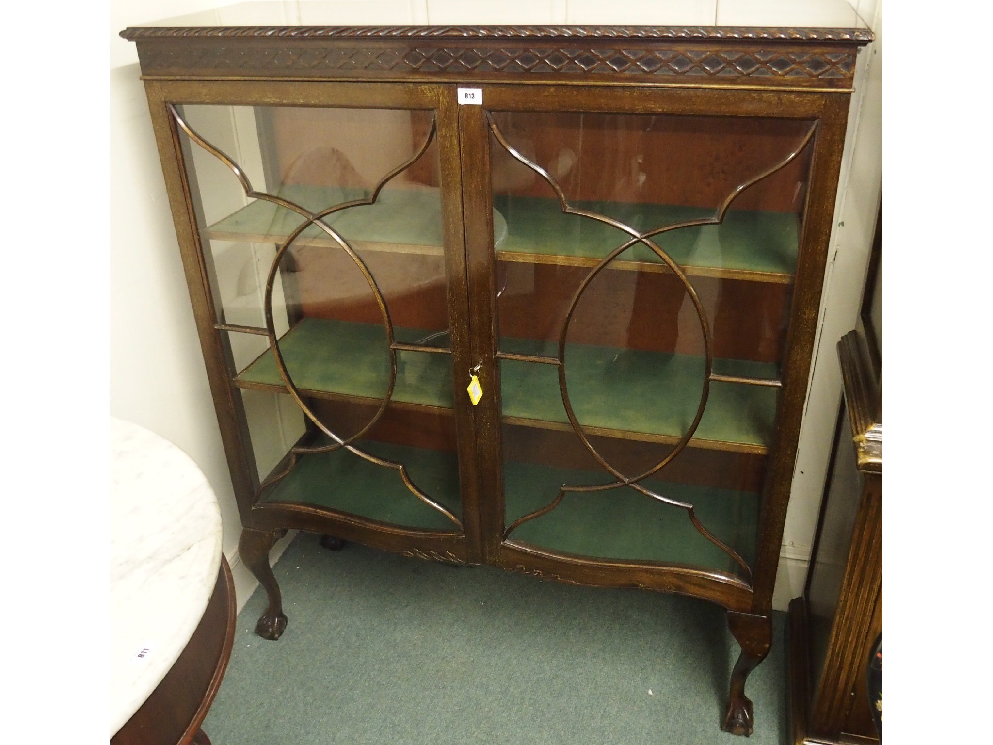 Appraisal: An Edwardian mahogany glazed display cabinet x x cm