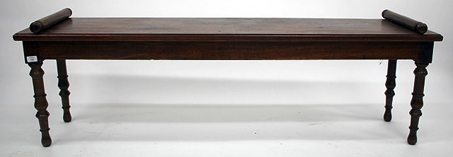 Appraisal: AN OLD WINDOW SEAT BENCH standing on turned tapering supports