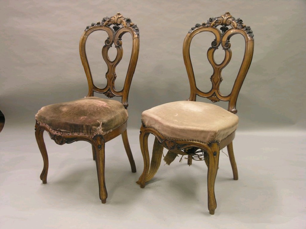 Appraisal: A set of six Victorian walnut dining chairs the double-scroll