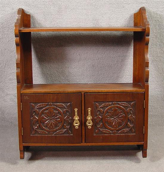 Appraisal: Colonial Revival Hanging Shelf Circa Walnut stained poplar Shallow relief