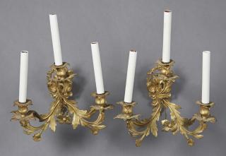 Appraisal: Pair of Brass Louis XV Style Three Light Sconces early