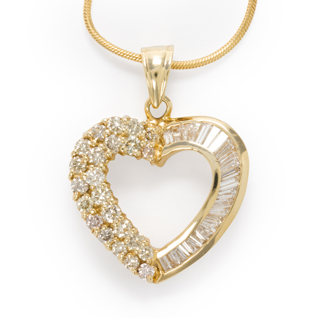 Appraisal: A YELLOW DIAMOND DIAMOND AND FOURTEEN KARAT GOLD PENDANT NECKLACE