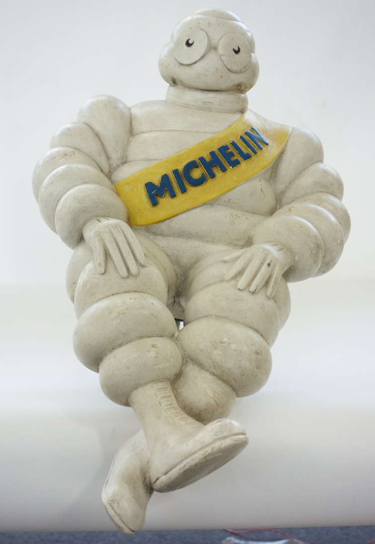 Appraisal: A Michelin 'Bibendum' man with metal mount to rear cm