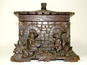 Appraisal: An early th century Black Forest wooden cigar-box carved as