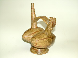 Appraisal: A South American twin section pottery vessel with figural type