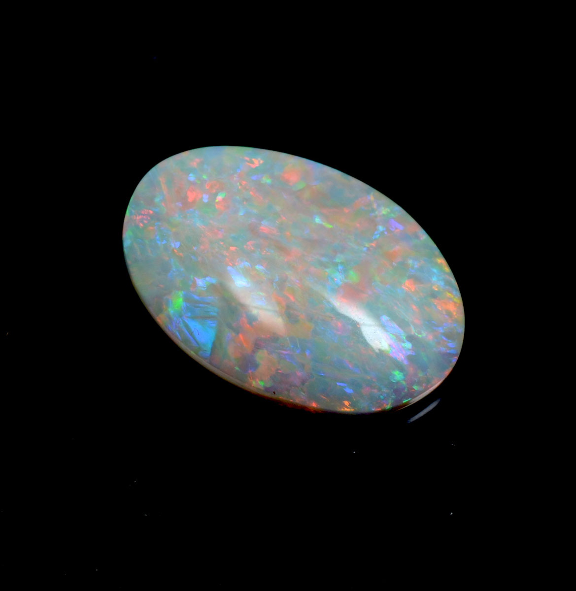 Appraisal: CT OPAL GEMSTONE Ct Red-Orange with blue-green Pinfire play-of-color Very