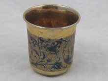 Appraisal: A Russian silver gilt beaker with niello decoration hallmarked Moscow