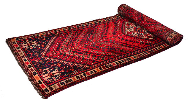 Appraisal: AN ORIENTAL RED GROUND RUNNER with central diamond motif flanked