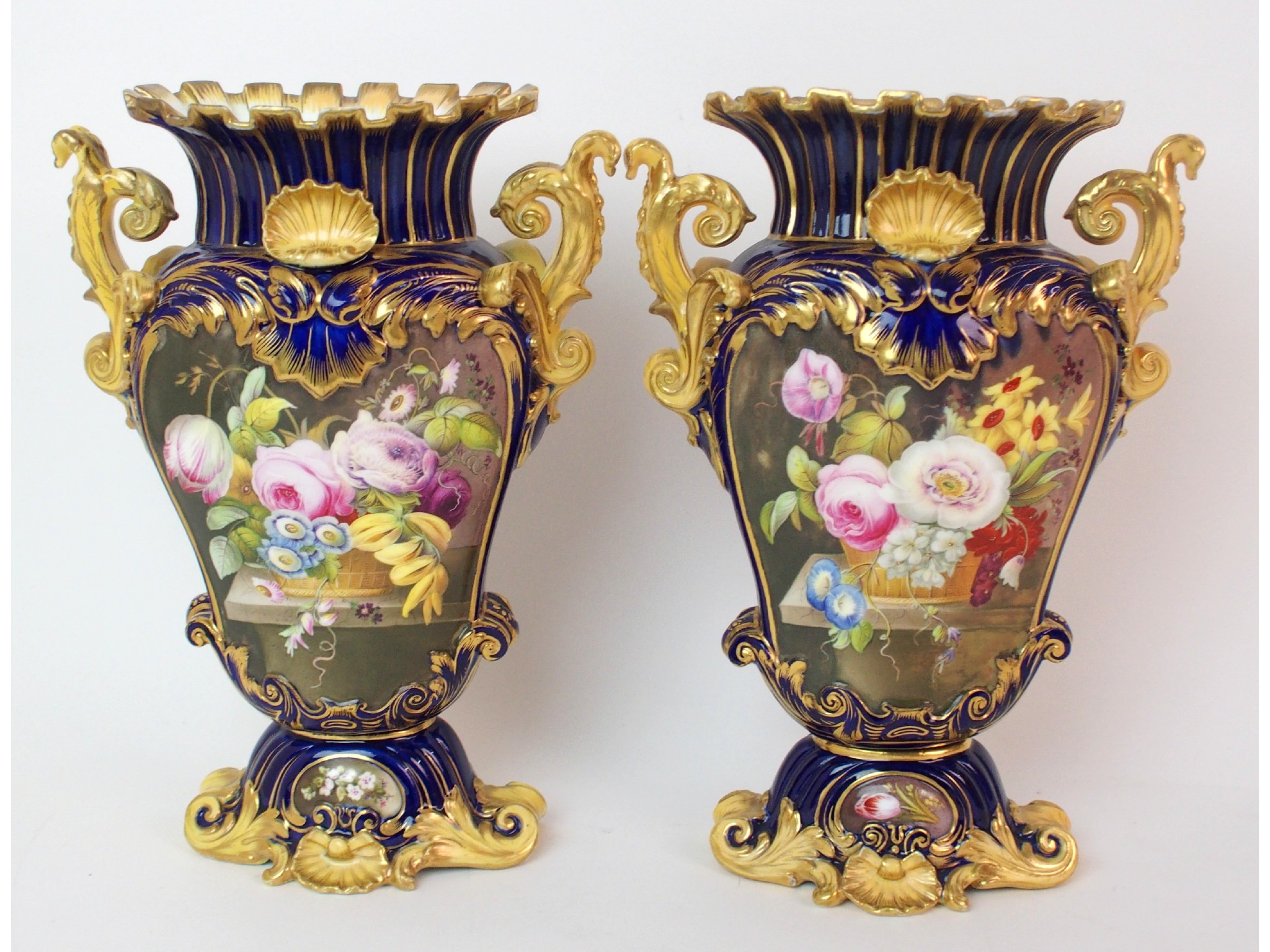 Appraisal: A pair of Coalport painted porcelain vasesRococo-style double-handled tapering flattened