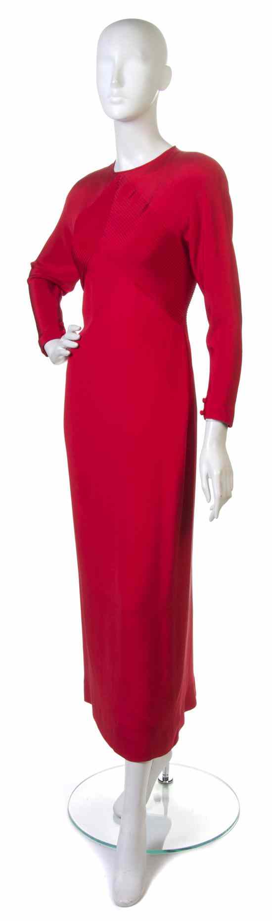 Appraisal: A Bill Blass Red Silk Evening Gown with ribbed detail