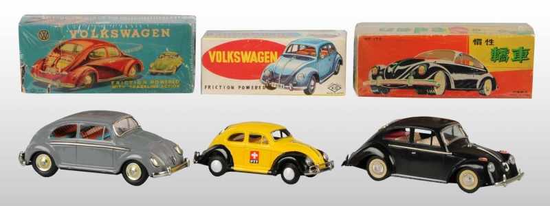 Appraisal: Lot of Tin Plastic Volkswagen Friction Toys Description Working Includes