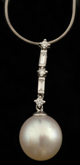 Appraisal: A South Sea pearl and diamond pendant The round pearl