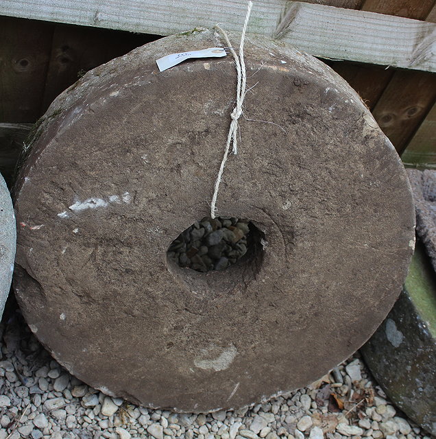 Appraisal: AN OLD GRINDING STONE cm diameter