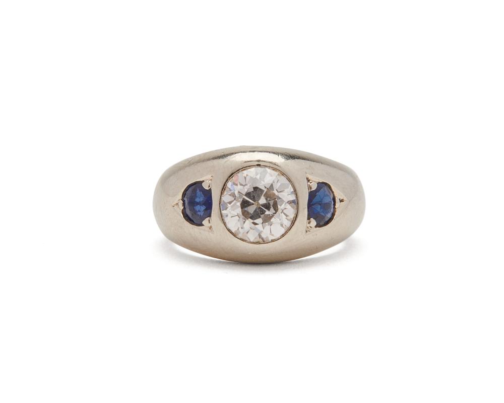 Appraisal: K Gold Diamond and Sapphire Ring the gypsy-set ring centering