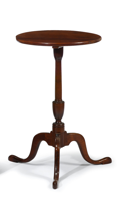 Appraisal: Mahogany candlestandPlain circular top on an urn turned pedestal cabriole