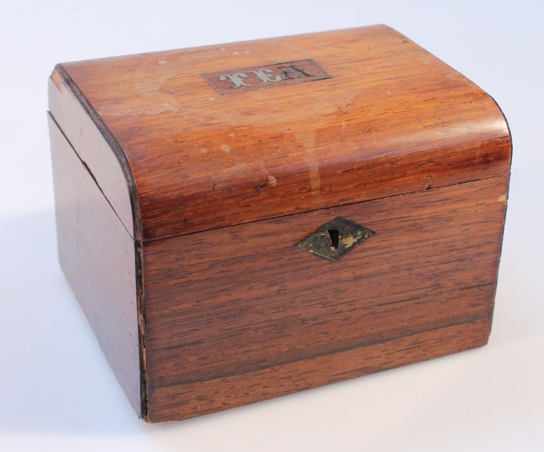 Appraisal: A thC rosewood tea caddy the domed rectangular top hinging