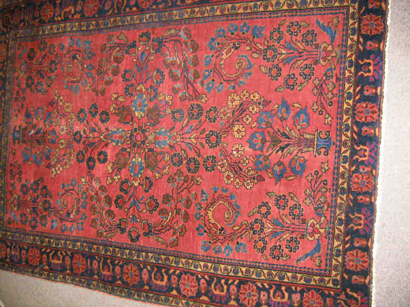 Appraisal: SAROUK THROW RUG The red field with allover vase and