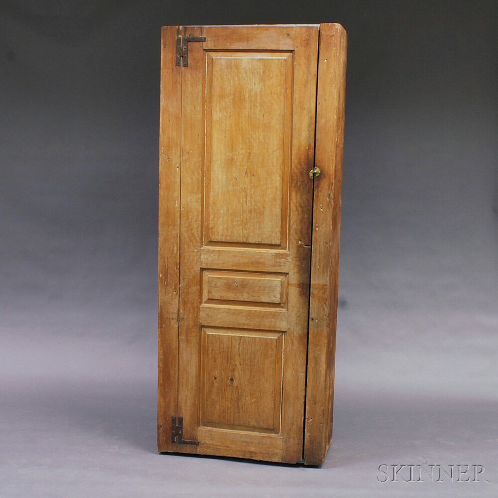 Appraisal: Country Pine Chimney Cupboard th century the paneled door opening