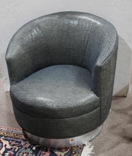 Appraisal: Swivel barrel chair attributed to Milo Baughman Swivel barrel chair