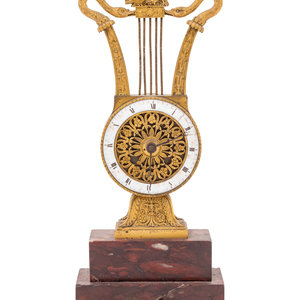 Appraisal: An Empire Style Gilt Bronze and Rouge Marble Clock th