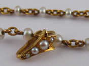 Appraisal: A yellow metal tests carat gold seed pearl necklace with