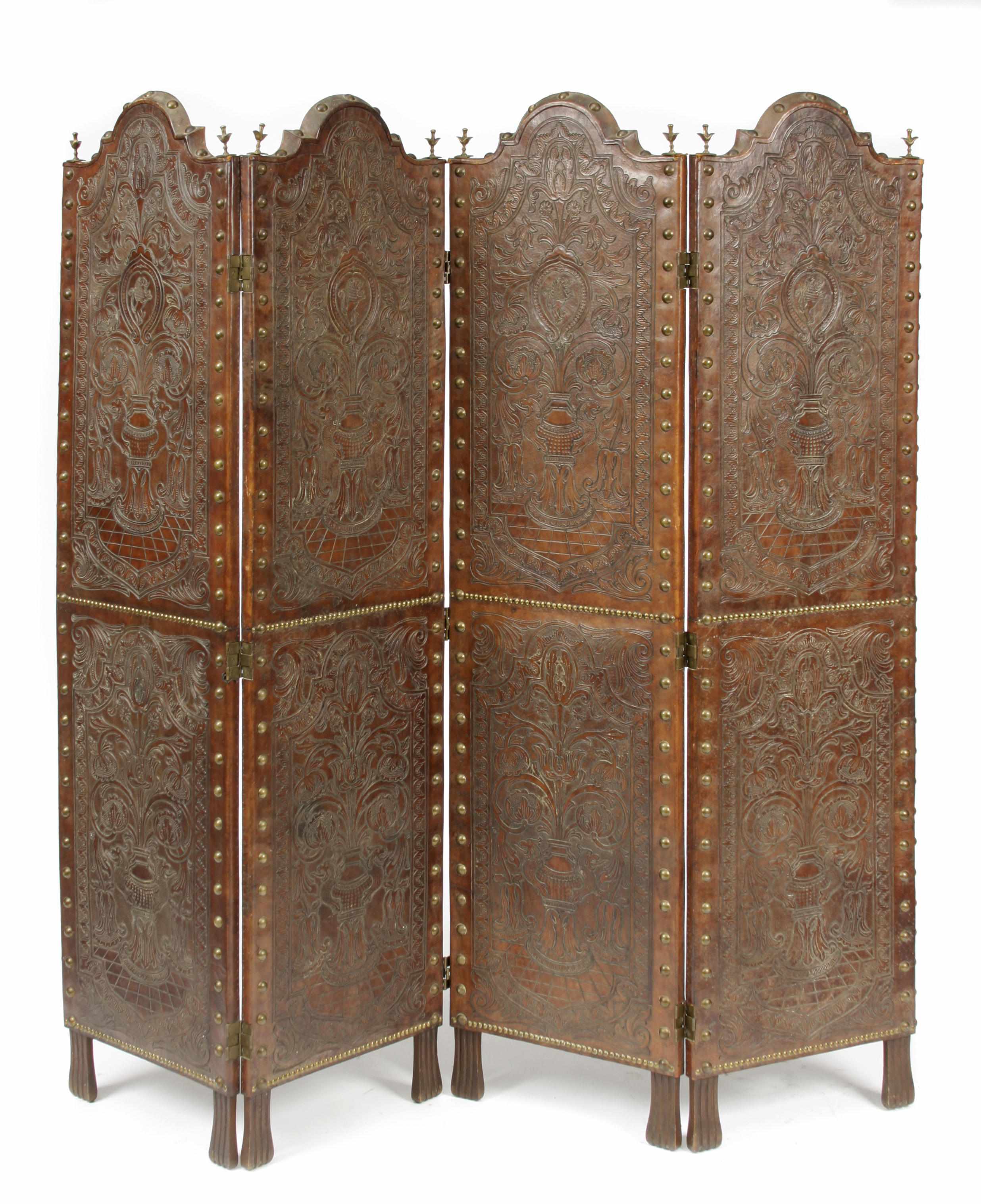 Appraisal: A Spanish Baroque style four panel embossed leather floor screen