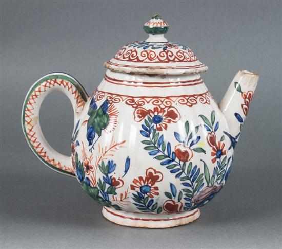 Appraisal: Dutch polychrome Delftware teapot circa chinoiserie style decoration with flowers