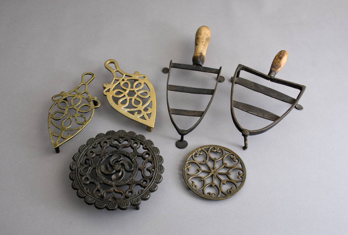 Appraisal: SIX EARLY AMERICAN IRON AND BRASS TRIVETS