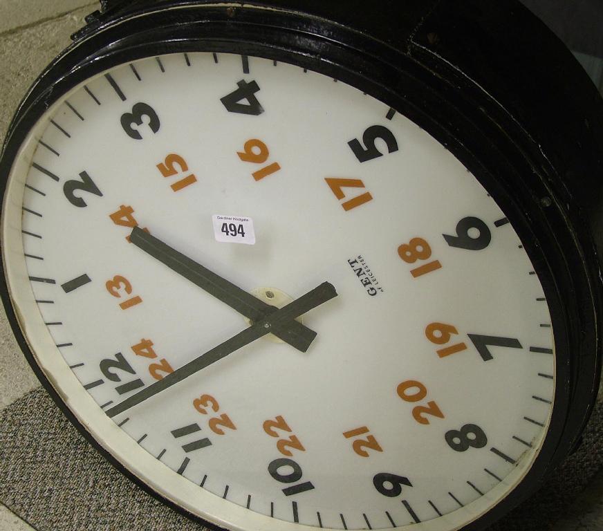 Appraisal: Gent double sided slave clock with black and red twenty-four