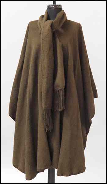 Appraisal: M L KESSLER BROWN ALPACA CAPE Bearing a button and