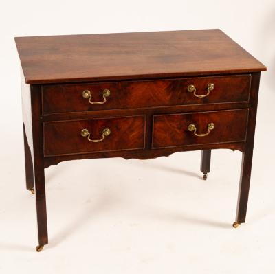 Appraisal: A George III mahogany side table circa the rectangular top